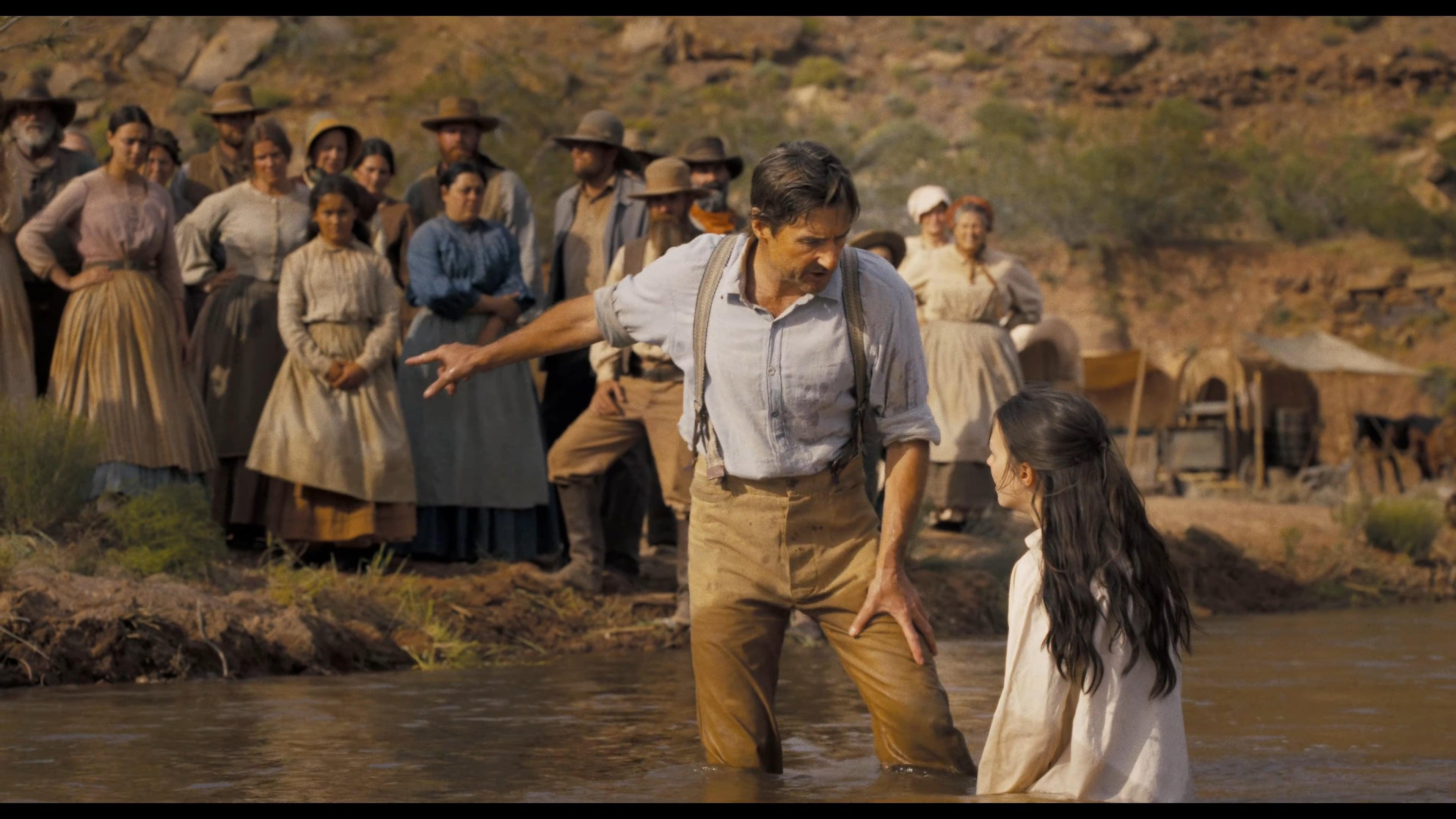 A settler (Luke Wilson) attempts to show one of his followers the light of God in Horizon: An American Saga (2024), New Line Cinema