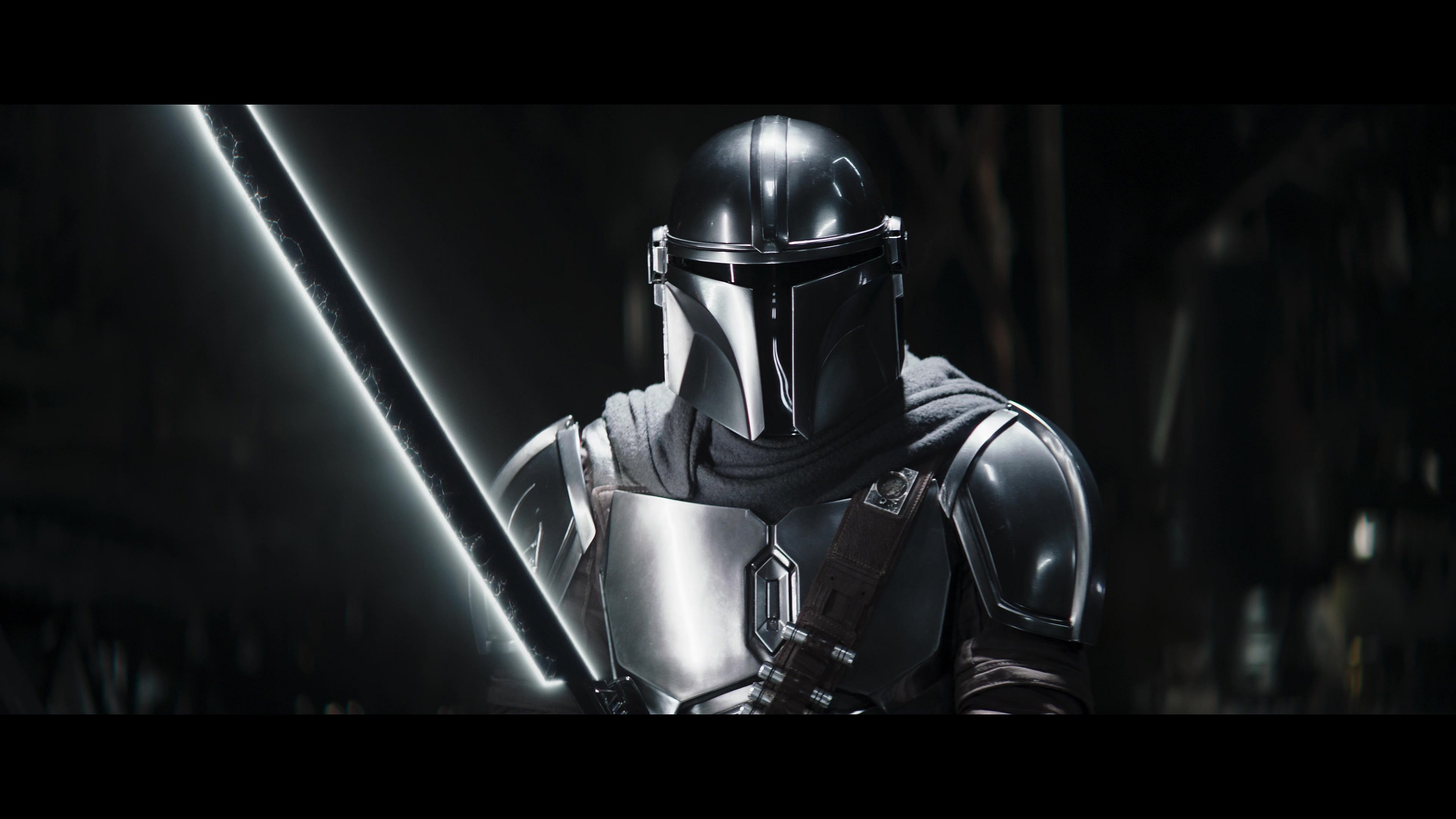 Din Djarin (Pedro Pascal) struggles to wield the Darksaber in The Book of Boba Fett Season 1 Episode 5 "Return of the Mandalorian" (2022), Disney