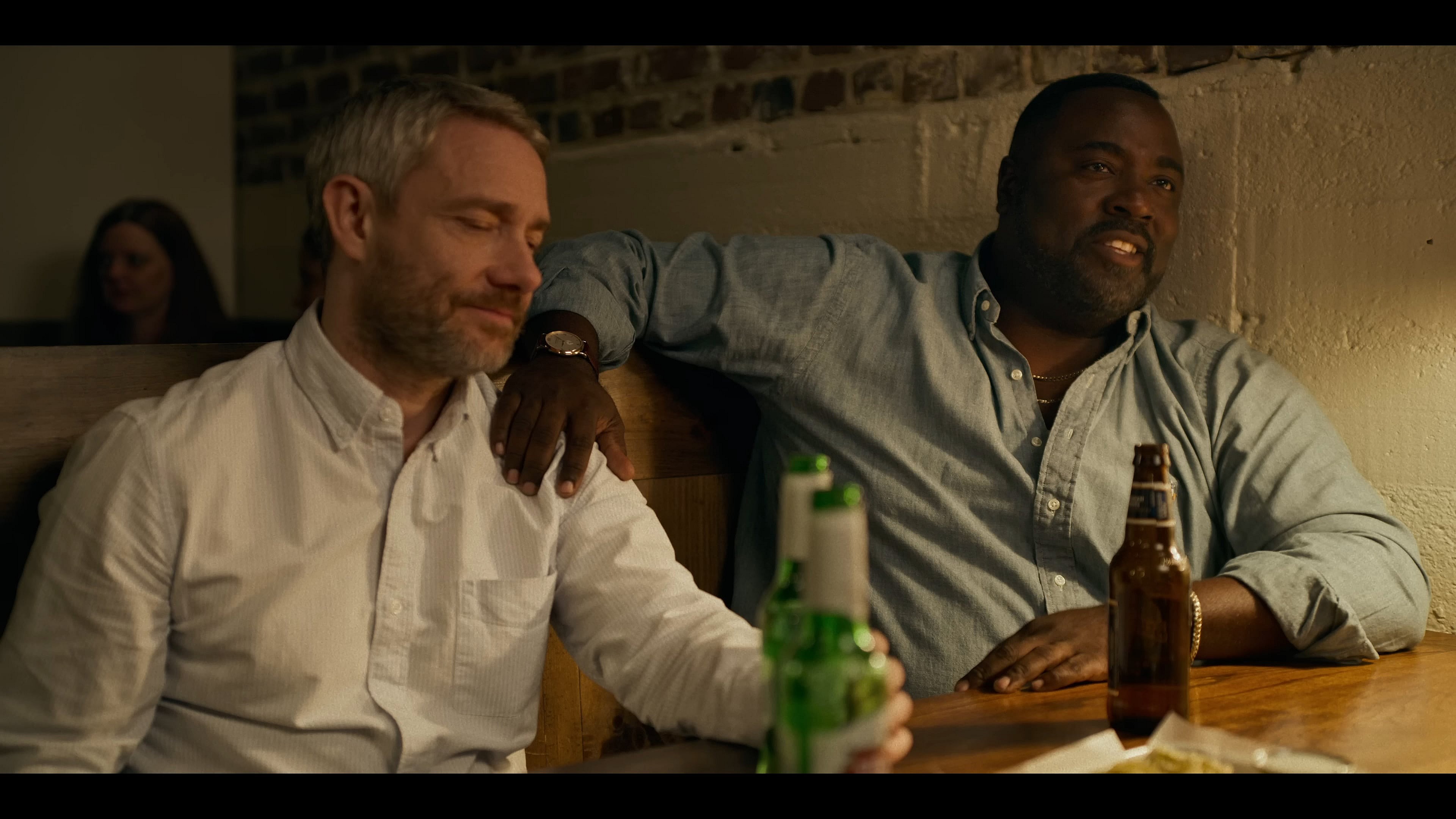 Martin Freeman as Jonathan Miller and Bashir Salahuddin as Boris Fillmore in Miller's Girl (2024), Lionsgate