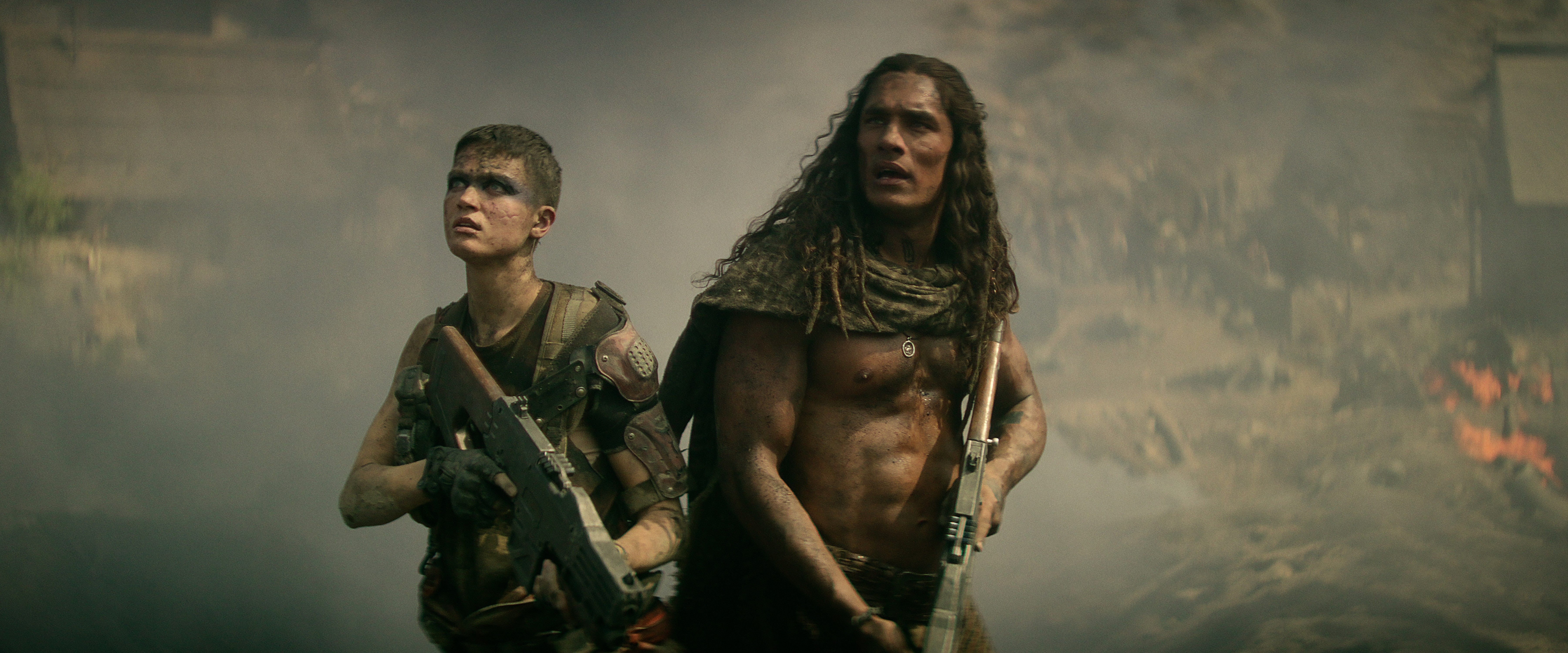 Rebel Moon — Part Two: The Scargiver. (L-R) Elise Duffy as Milius and Staz Nair as Tarak in Rebel Moon — Part Two: The Scargiver. Cr. Netflix © 2024.