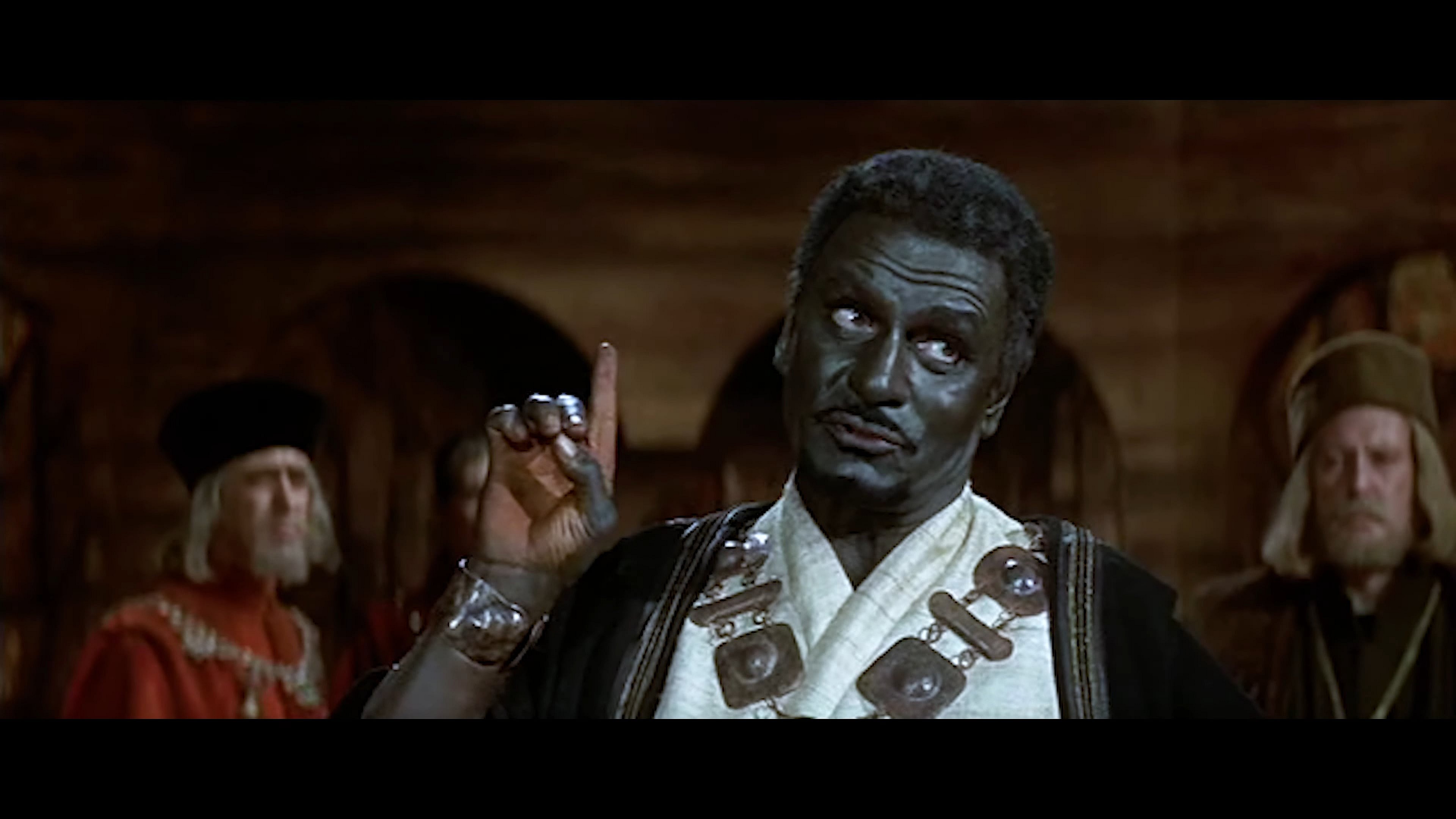 Othello (Laurence Olivier) offers his counsel to Venice's leaders in Othello (1965), National Theatre of Great Britain