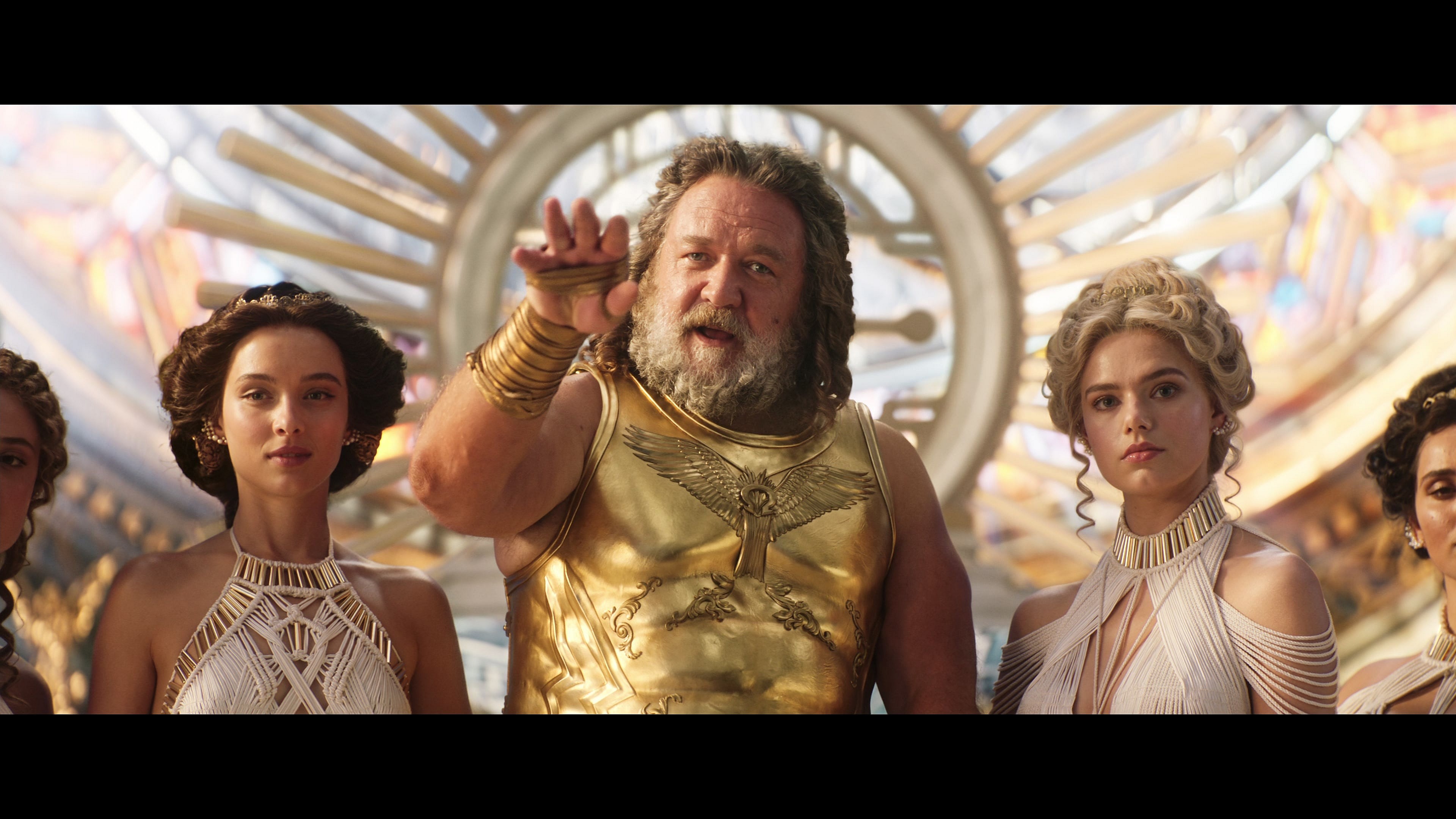 Zeus (Russell Crowe) de-robes Thor (Chris Hemsworth) in an attempt to humiliate him in Thor: Love and Thunder (2022), Marvel Entertainment