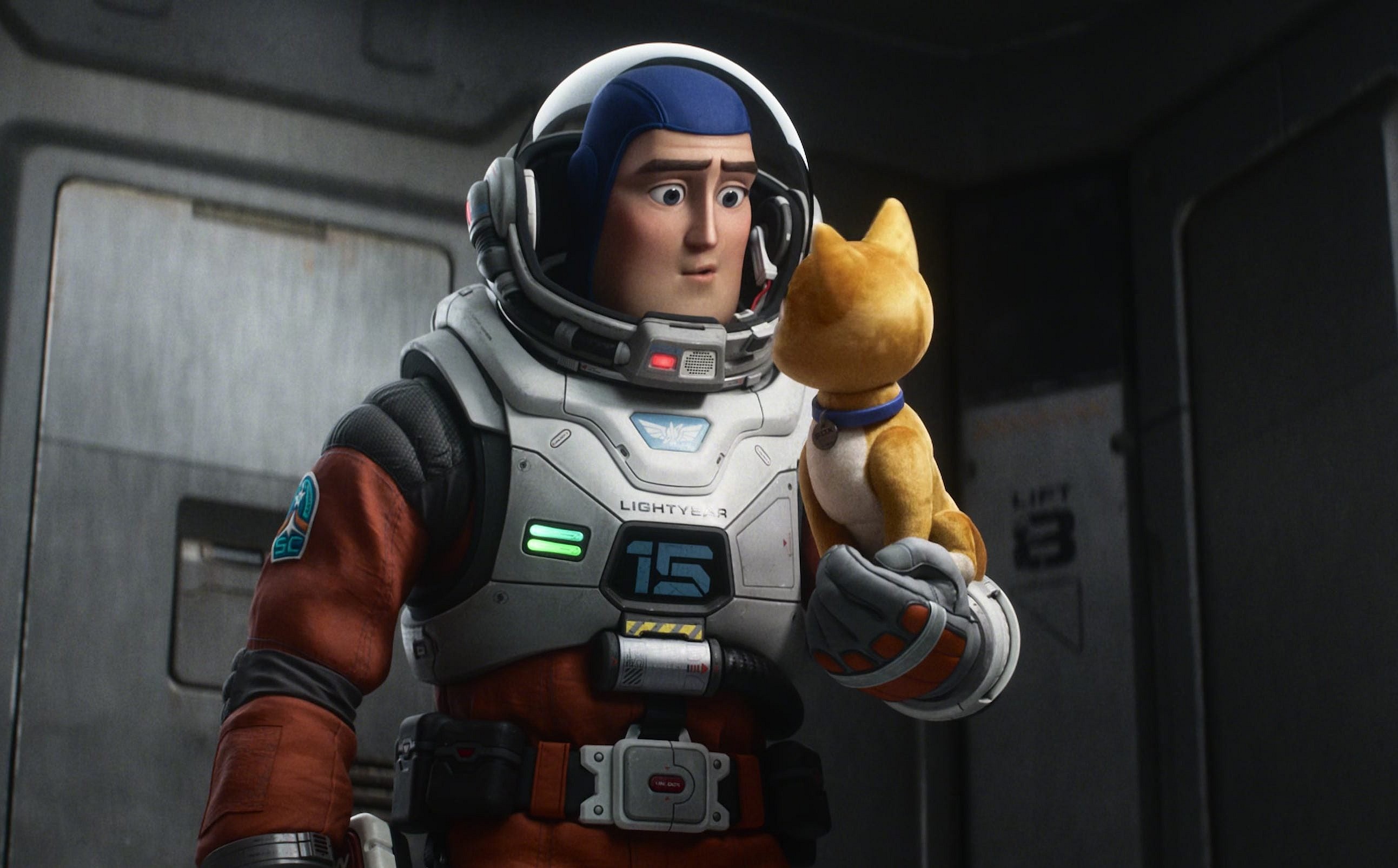 Buzz (Chris Evans) looks to Sox (Peter Sohn) for a pep-talk in Lightyear (2022), Pixar Animation Studios