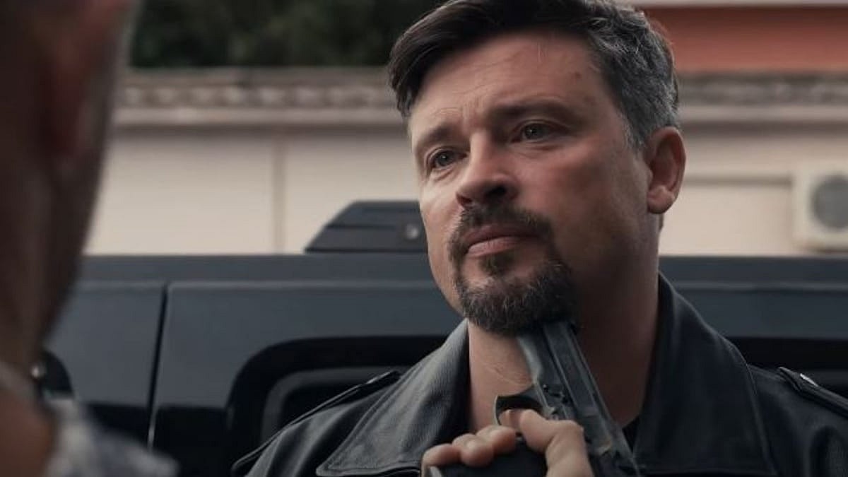 Griff (Cam Gigandet) holding a gun to Terry