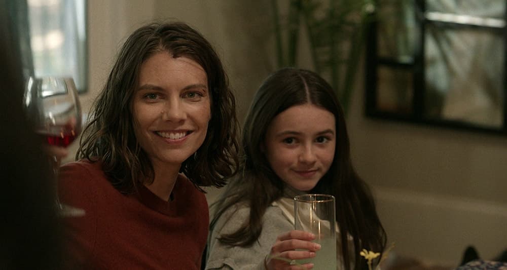 Maggie and Judith at the dinner table in 'The Walking Dead,' AMC+