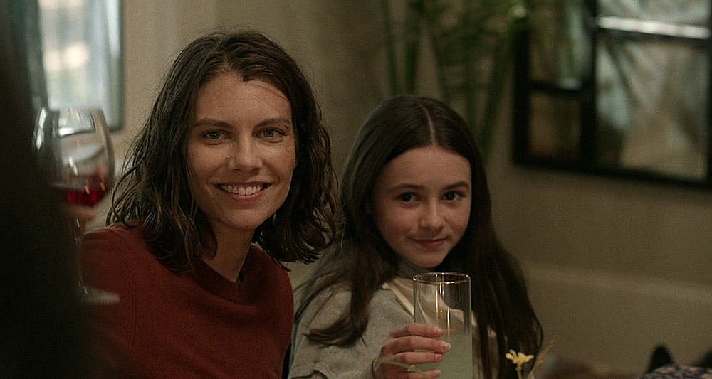 Maggie and Judith at the dinner table in 'The Walking Dead,' AMC+