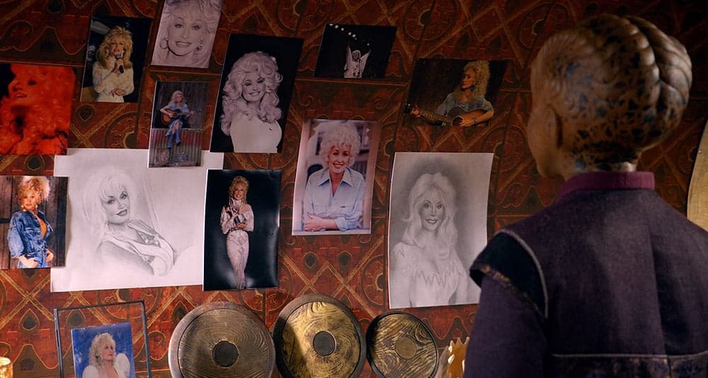 Topa sees pictures of Dolly Parton in The Orville