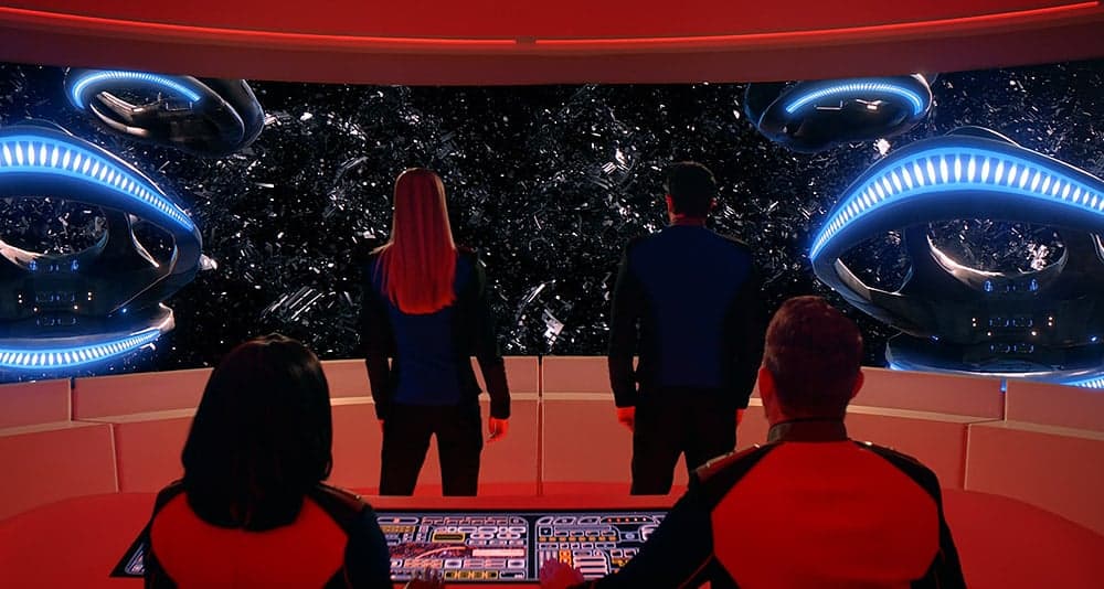 Mercer and Grayson viewing Kaylon wreckage in The Orville