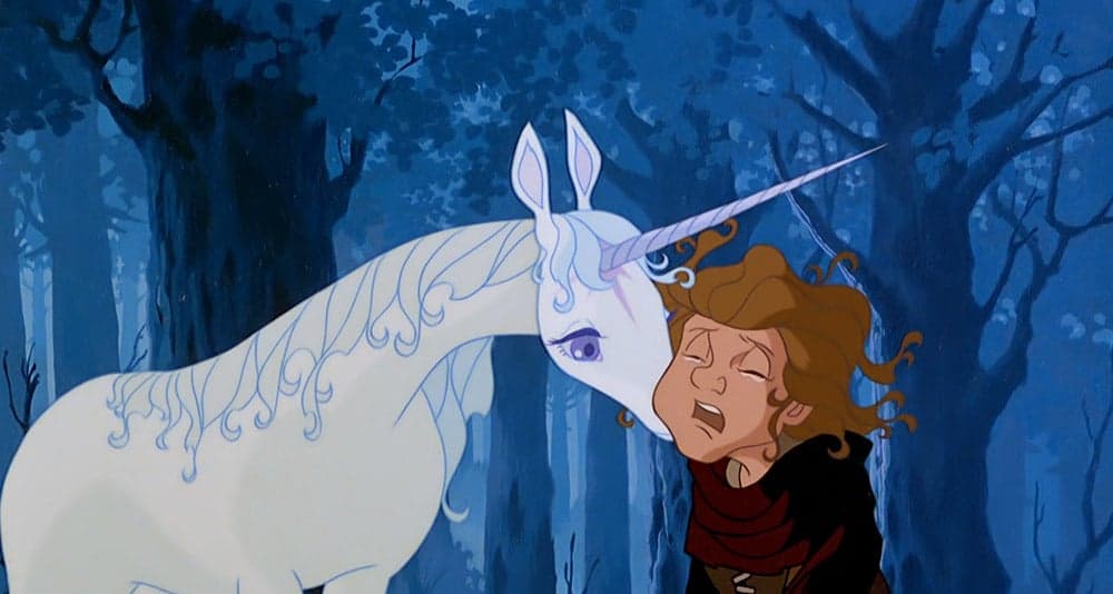 The Unicorn tries to comfort Molly Grue in The Last Unicorn, Rankin/Bass Productions