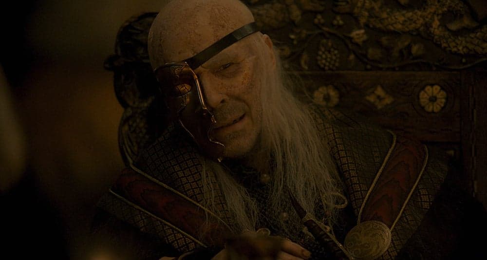 A dying King Viserys at a royal feast in House of the Dragon, HBO