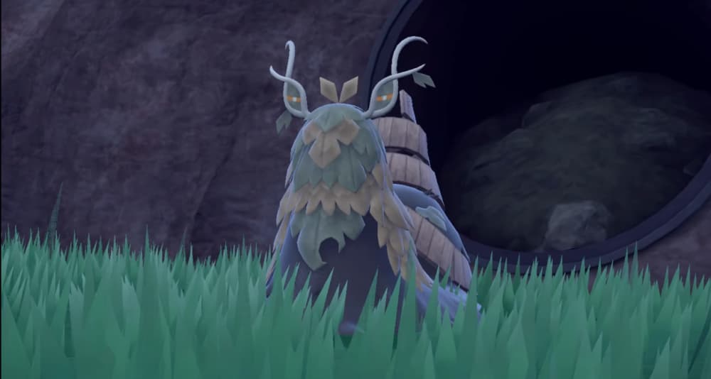 Wo-Chien stands before the Grasswither Shrine via Pokémon Scarlet & Violet (2022), Nintendo