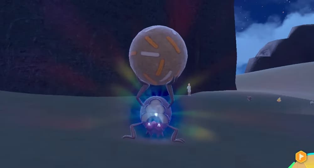 Rellor holds its mud ball aloft as it begins to evolve via Pokémon Scarlet & Violet (2022), Nintendo