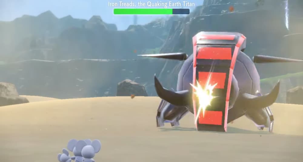 Maushold used Population Bomb on Iron Treads, the Quaking Earth Titan via Pokémon Scarlet & Violet (2022), Nintendo