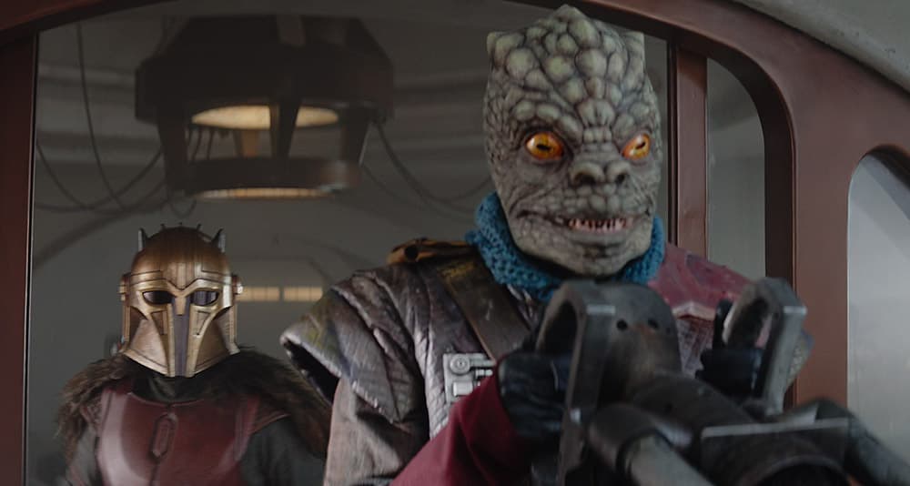 The Armorer sneaks up behind a pirate in 'The Mandalorian' (2023), Disney+ 