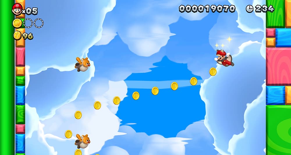 Flying Squirrel Mario soars through clouds between coins and Waddlewings via New Super Mario Bros