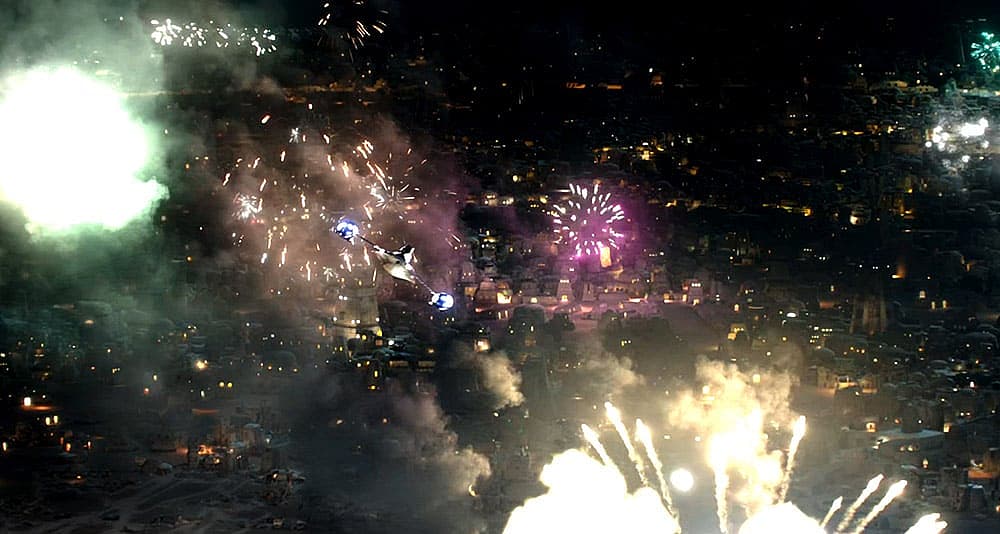 Din Djarin leaves Tatooine during a Boonta Eve fireworks ceremony in The Mandalorian (2023), Disney+
