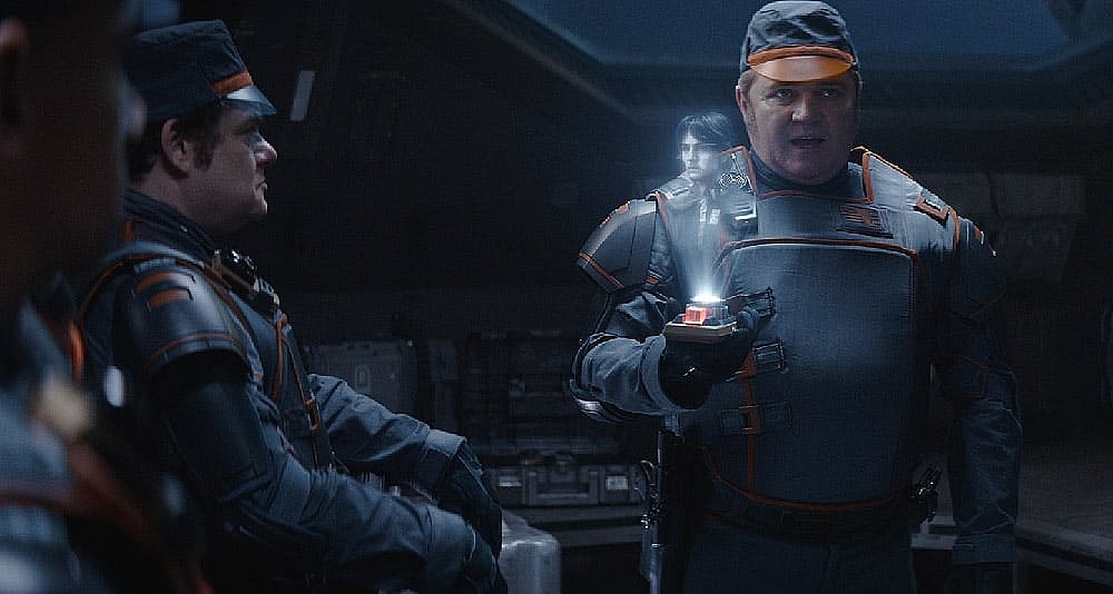 Security personnel review Cassian's picture in Star Wars: Andor, Disney+