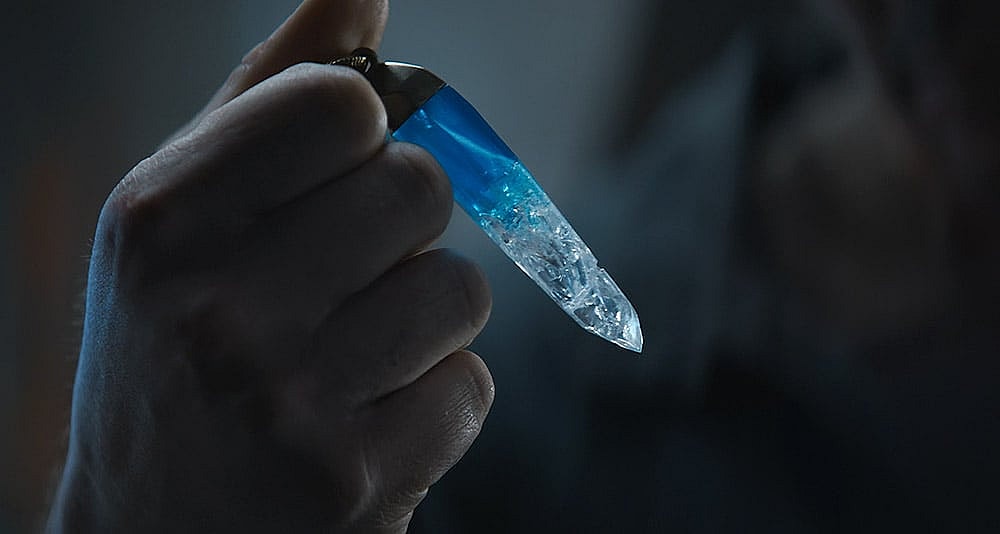 Cassian holds a kyber crystal in Star Wars: Andor, Disney+