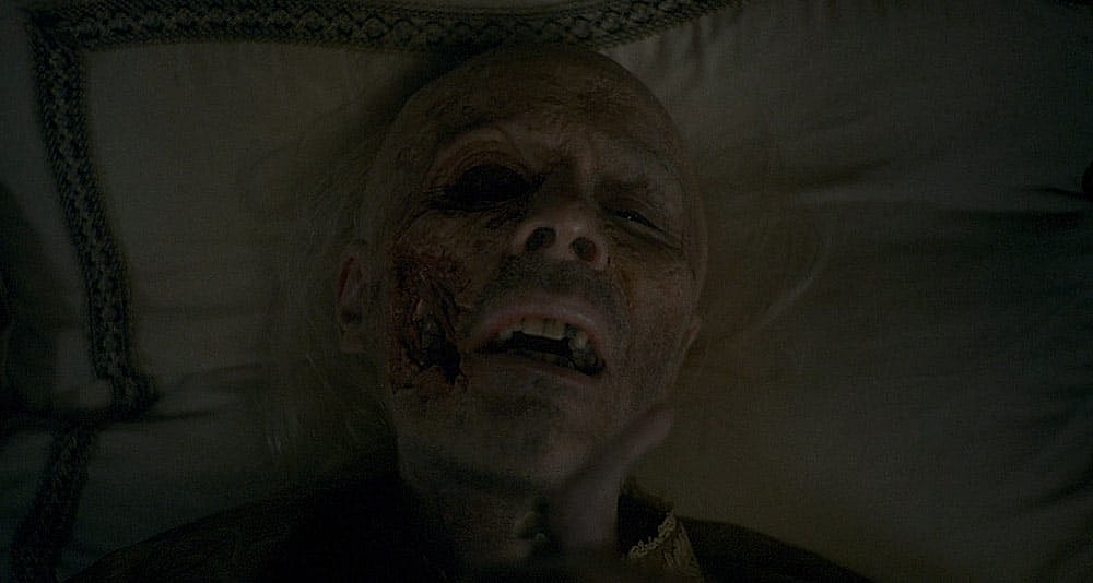 King Viserys dying in his bed in House of the Dragon, HBO