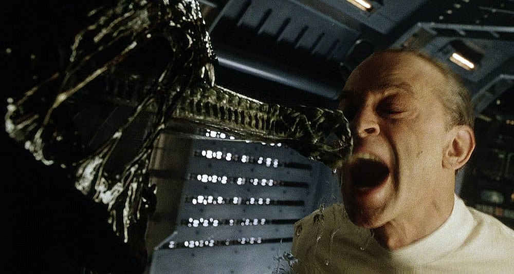 Gediman taunts a xenomorph in Alien Resurrection, 20th Century Fox