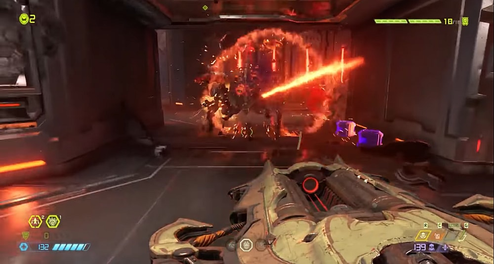 The Doomslayer blasts an Arachnotron with a Ballista via Doom Eternal (2020), Bethesda Softworks