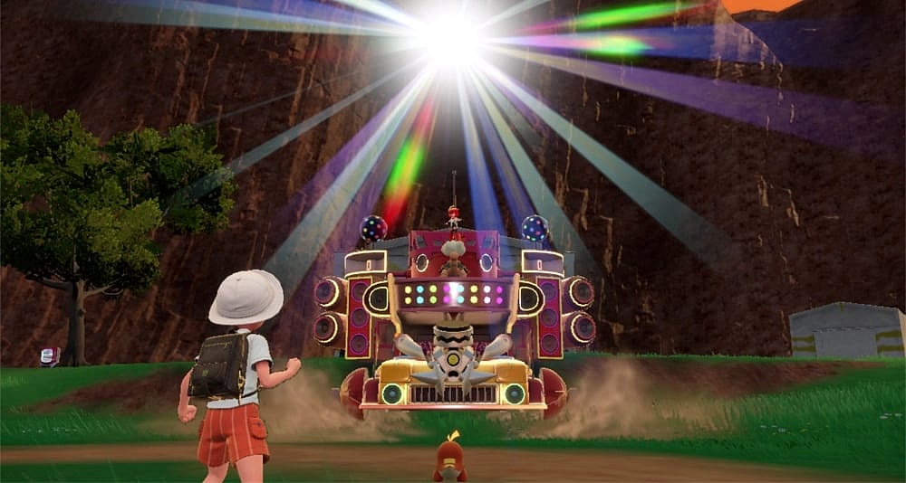 The player and Fuecoco face off against Torkoal and Mela of Team Star; riding atop a Starmobile while a brilliant light dazzles overhead via Pokémon Scarlet & Violet (2022), Nintendo