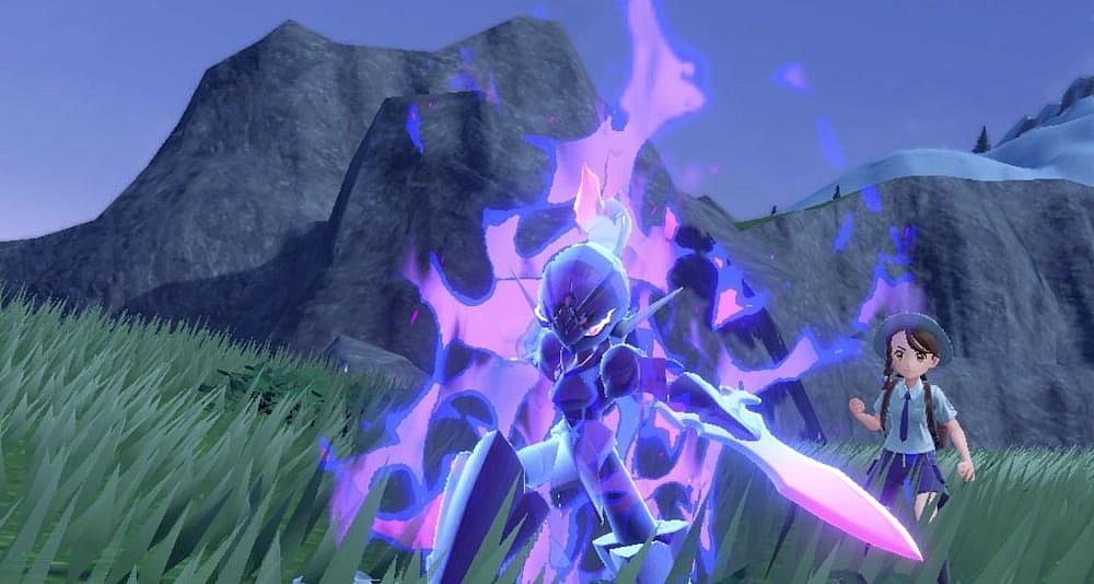 The player cheers on their Ceruledge, bathed in ghostly and malicious energy via Pokémon Scarlet & Violet (2022), Nintendo
