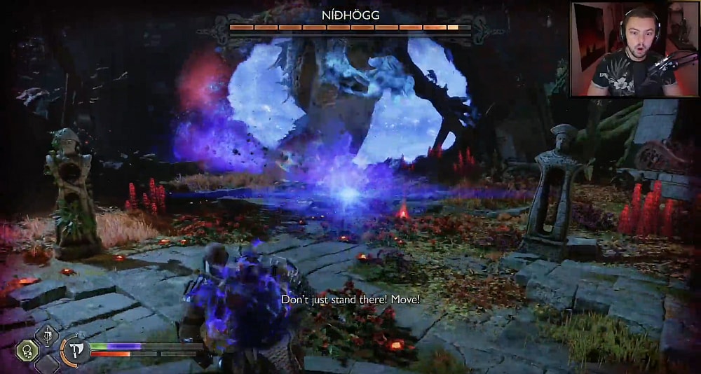 Twitch Streamer Elajjaz despairs as NPCs continue to blurt advise during the Nidhögg boss battle via God of War Ragnarök (2022), Sony Interactive Entertainment
