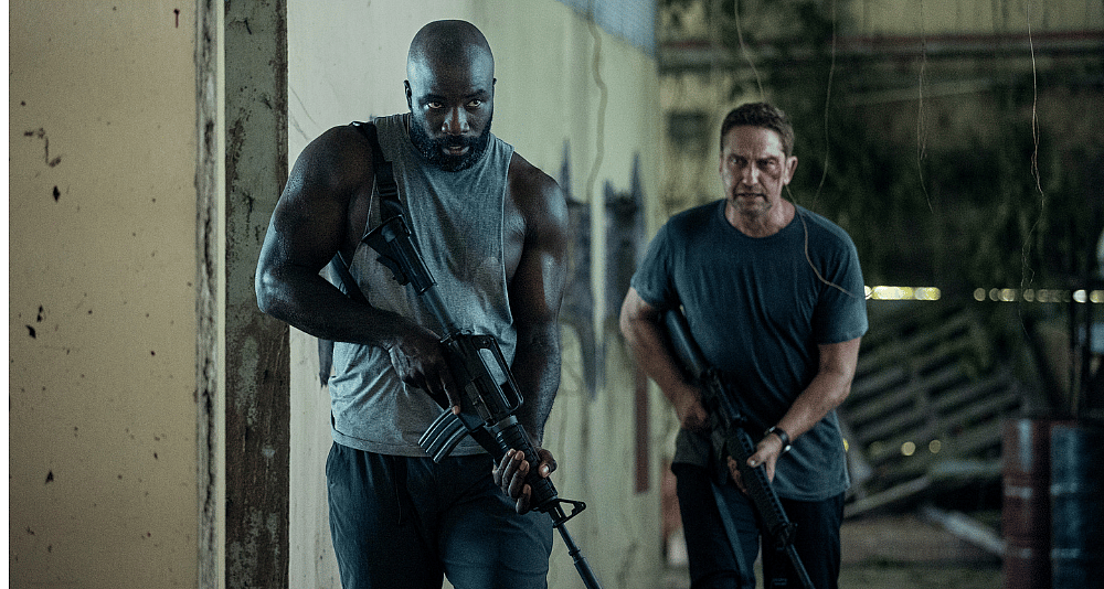 Mike Colter as Louis Gaspare and Gerard Butler as Brodie Torrance in Plane. Photo Credit: Kenneth Rexach