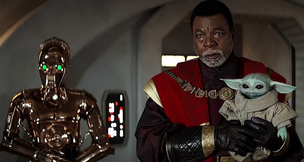 Greef Karga protects Grogu in 'The Mandalorian' (2023), Disney+