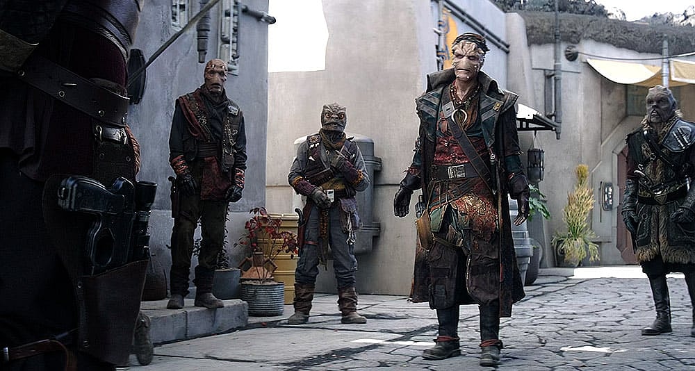 Greef Karga confronts a group of pirates in 'The Mandalorian' (2023), Disney+