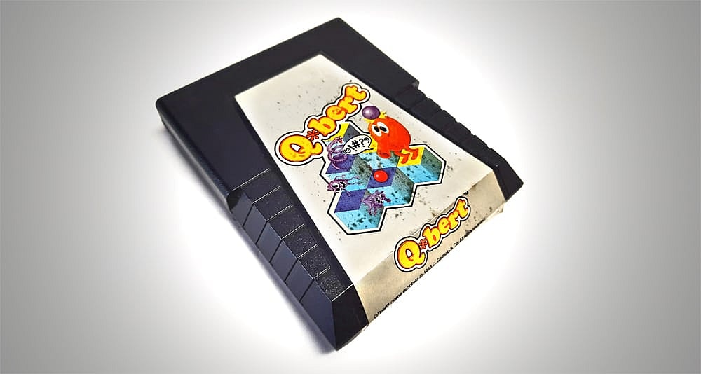 'Q*bert' (1983) video game cartridge playable on the Atari 2600 system.
