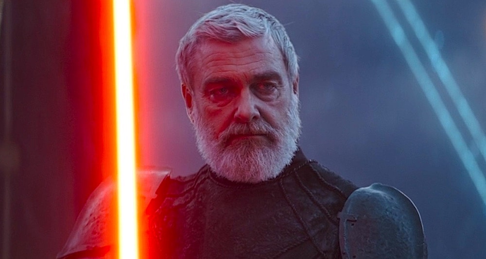 Baylan Skoll (Ray Stevenson) ignites his lightsaber as he prepares to battle Ahsoka Tano (Rosario Dawson) in Ahsoka Season 1 Episode 4 "Fallen Jedi" (2023), Lucasfilm