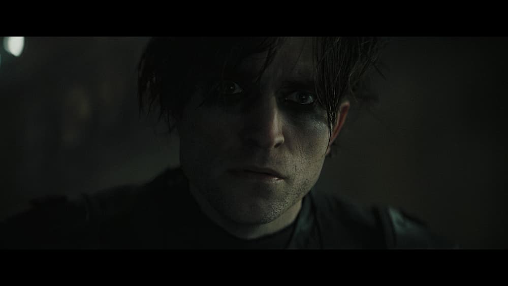 Bruce Wayne sees The Riddler's new video in The Batman (2022), Warner Bros. Pictures