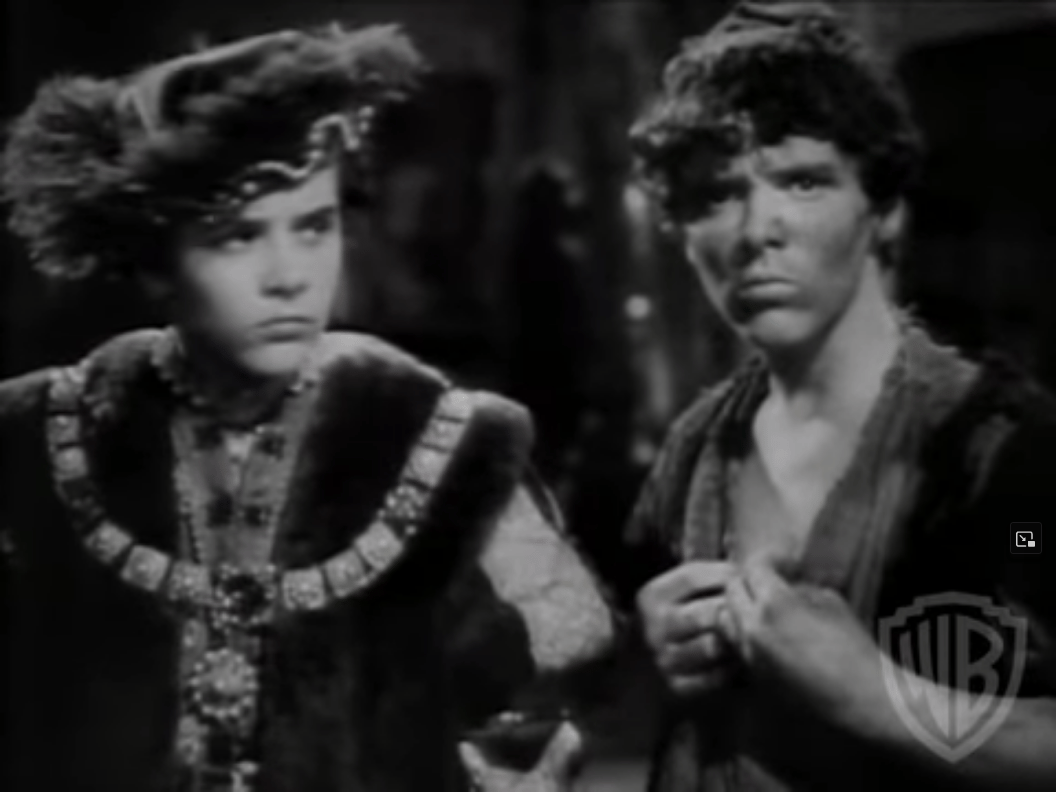 Edward Tudor (Bobby Mauch) and Tom Canty (Billy Mauch) formulate a plan in The Prince and the Pauper (1937), Warner Bros. Pictures