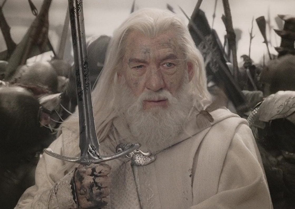 Gandalf the White (Sir Ian McKellen) draws his blade against the forces of Mordor during the Battle of the Morannon in The Lord of the Rings: Return of the King (2003), New Line Cinema