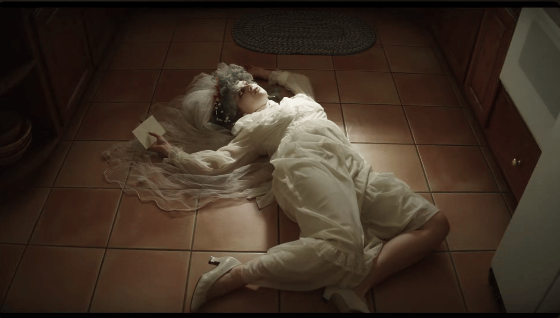 Anna Grace Barlow plays dead in Dramarama (2020), 1091/Ambrosia Films