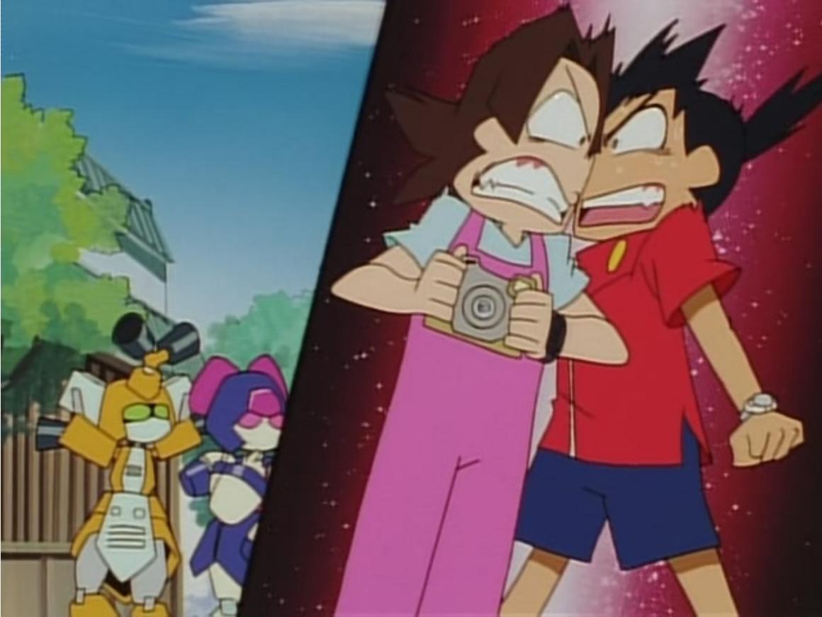 Ikki (Michiru Yamazaki) and Arika (Eri Sendai) argue during a tour of the Medabots Corporation in Medabots Season 1 Episode 21 "The Spy Who Robattled Me" (2001), Imagineer via DVD