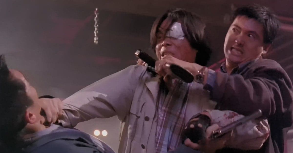 Tequila (Chow Yun-fat) and Alan (Tony Leung Chiu-wai) fight the vicious Mad Dog (Philip Kwok) in Hard Boiled (1992), Golden Princess Film Production