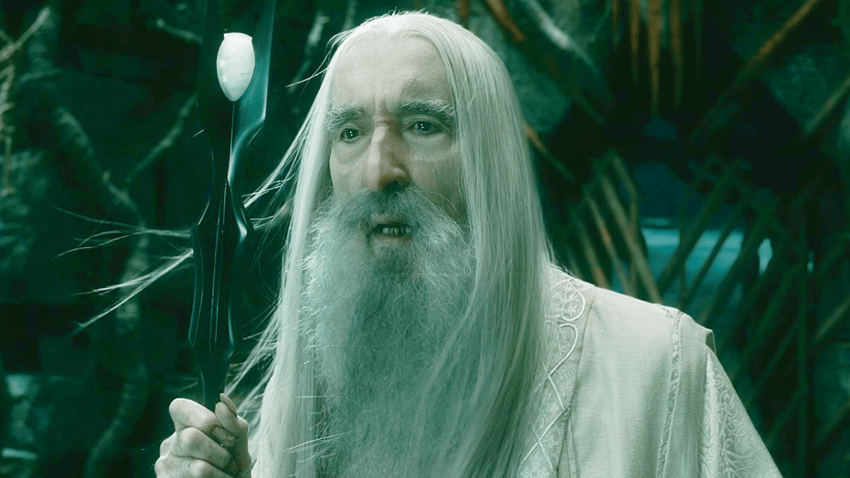 Saruman (Christopher Lee) comes to the rescue of Galadriel (Cate Blanchett) in The Hobbit: The Battle of the Five Armies (2014), New Line Cinema