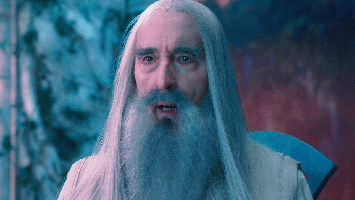 Saruman (Christopher Lee) offers counsel to Gandalf (Ian McKellen) regarding the potential return of Sauron (Alan Howard) in The Hobbit: An Unexpected Journey (2012), New Line Cinema