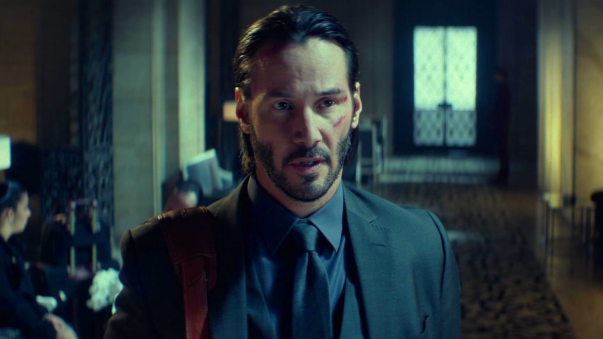 John Wick (Keanu Reeves) checks into The Continental in John Wick (2014), Lionsgate