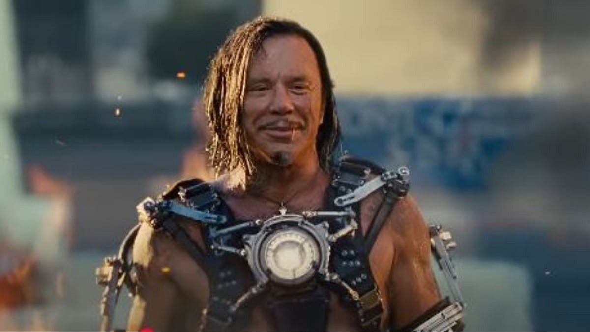Ivan Vanko (Mickey Rourke) smiling while whiplashing Iron Man (Robert Downey Jr. in Monaco in Iron Man 2 (2010), Marvel Studios