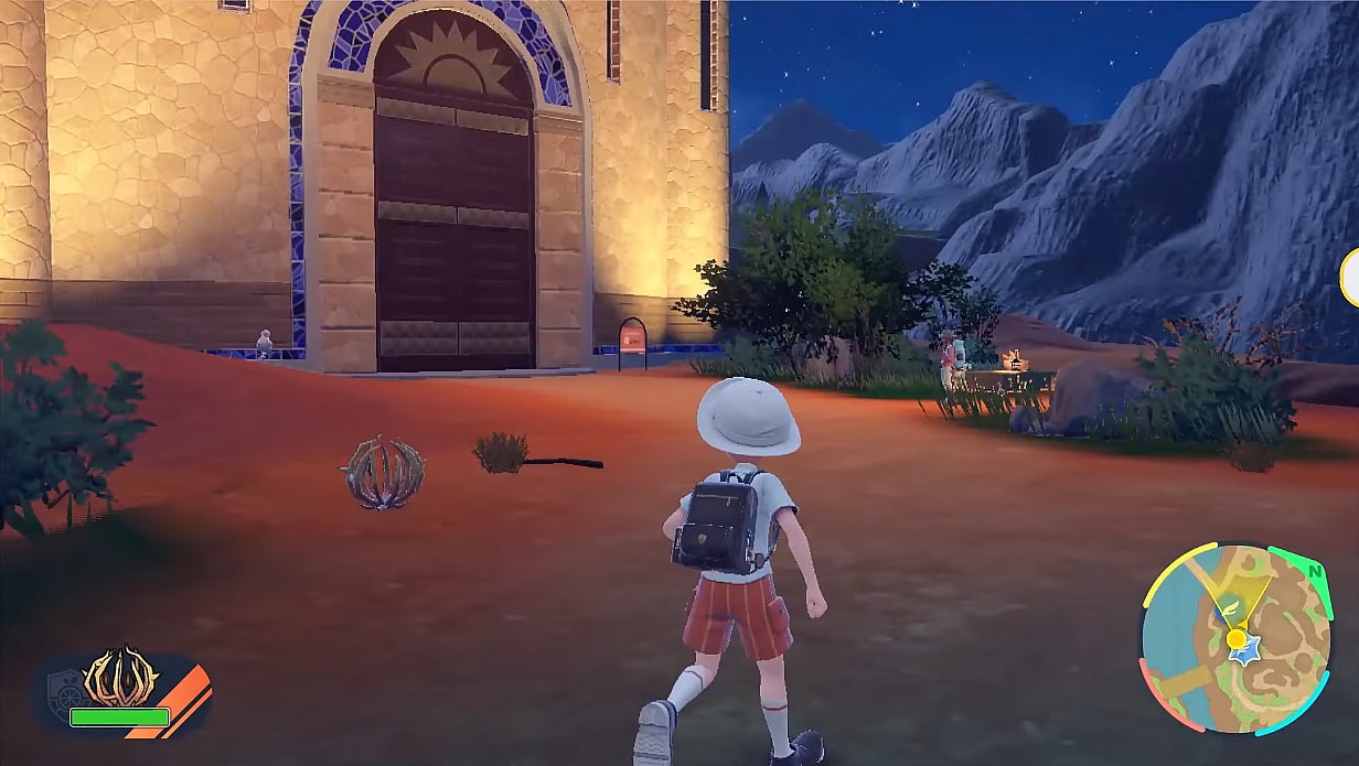 The player and their Bramblin stand before an imposing gate via Pokémon Scarlet & Violet (2022), Nintendo