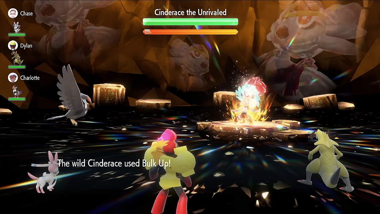 Tera-Fighting Cinderace uses Bulk Up to raise its stats in a Tera Raid Battle. It's fighting against Staraptor, Sylveon, Armarouge, and Haxorus via Pokémon Scarlet & Violet (2022), Nintendo