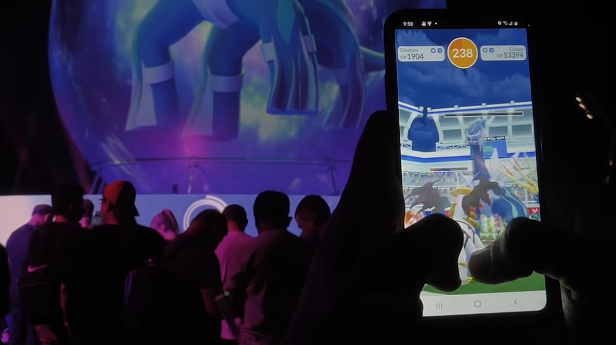 A player battles a Dialga in a Raid at a special event in Together We Raid | Legendary Night Recap, Pokémon GO!, YouTube