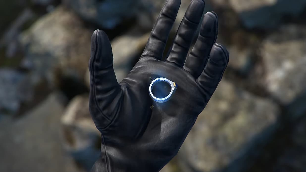 Unknown Ring of Power sits in gloved hand via The Lord of the Rings: Heroes of Middle-earth (2023)