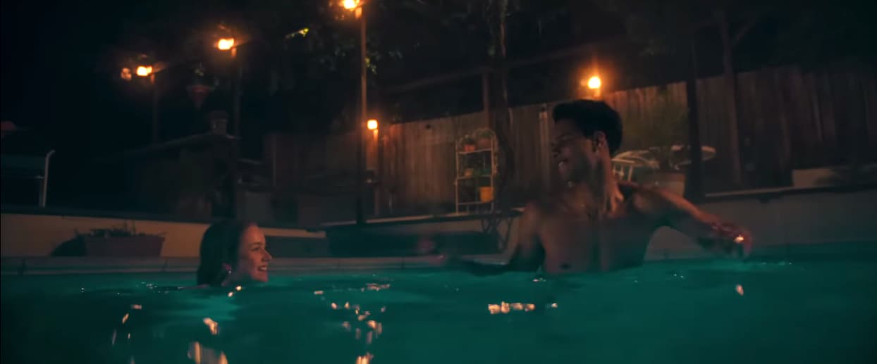 A boy, a girl, and a pool-Night Swim