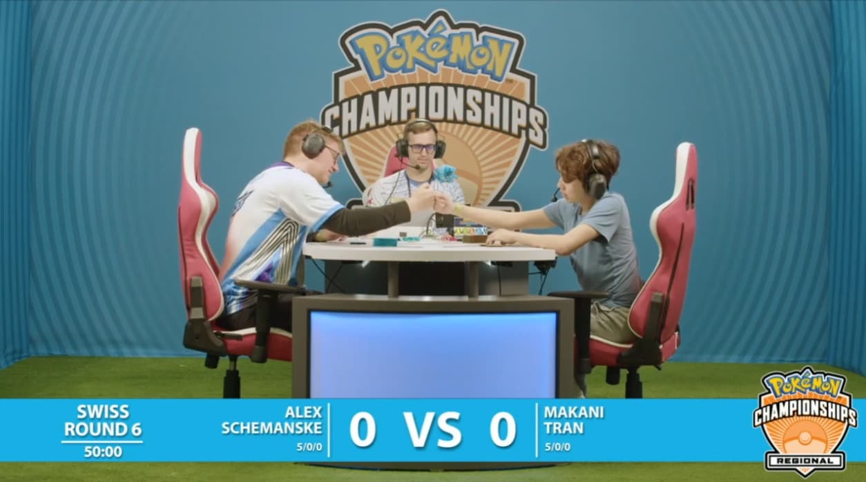 Makani Tran and Alex Schemanske fist bump at the start their match via TCG Day 1 | 2023 Pokémon Charlotte Regional Championships, PokemonTCG Twitch