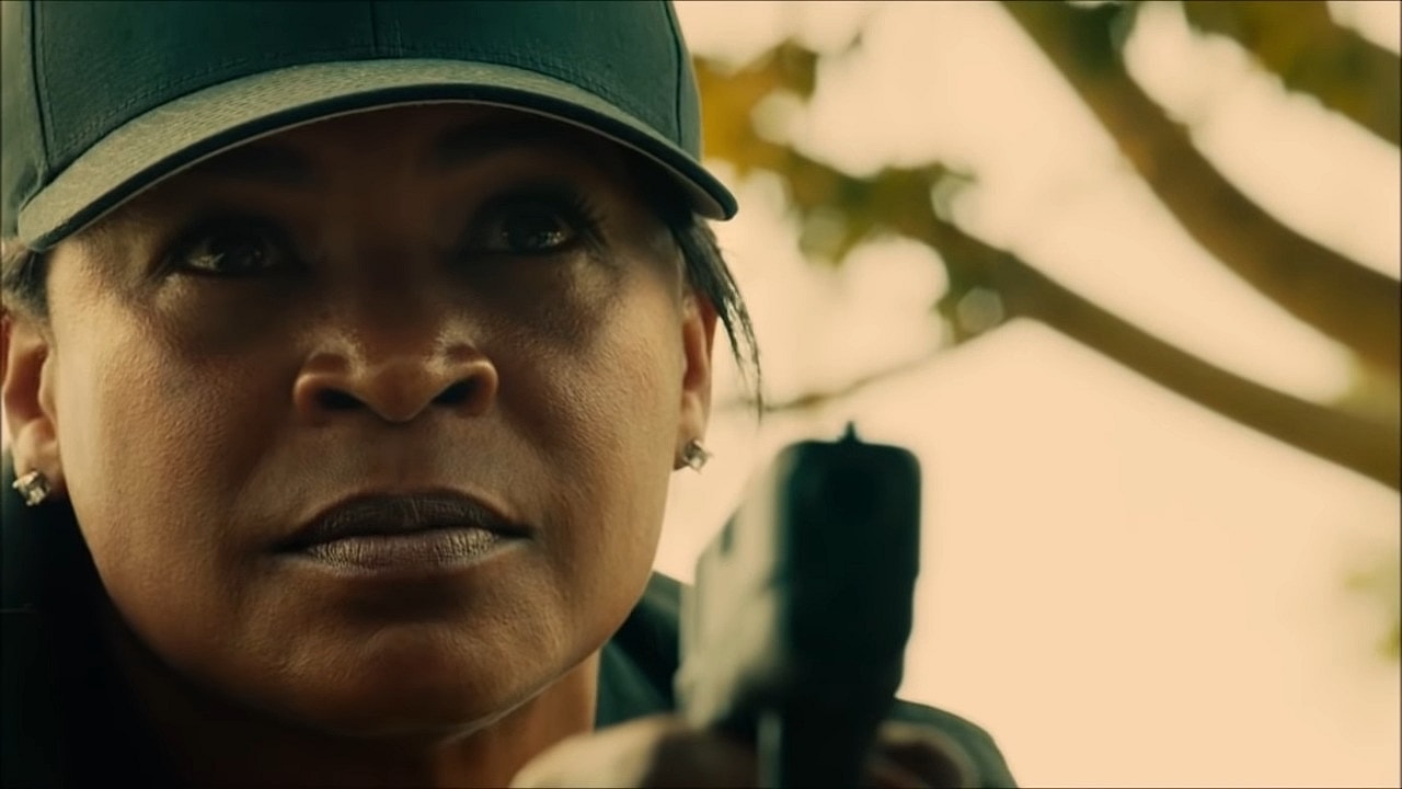 Shay Mosley (Nia Long) draws her gun in NCIS: Los Angeles Season 10 Episode 1 "To Live and Die in Mexico" (2018), CBS